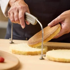 Justerbar kakebunnskjærer